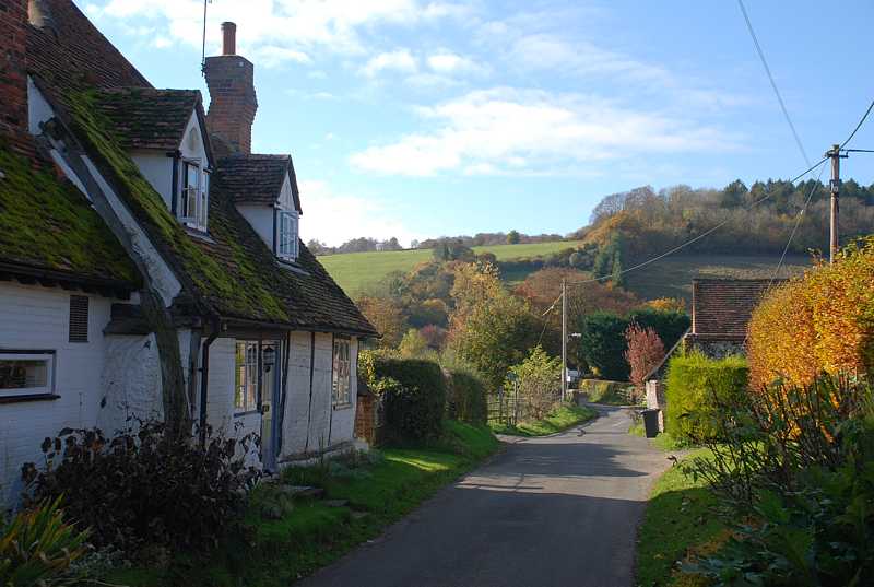 Old cottage beside a lane into Skirmett